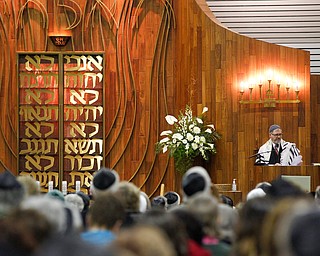 Rabbi Schonberger leads Minyan Service at the beginning of an interfaith vigil for the Pittsburgh Tree of Life Synagogue victims at Temple El Emeth in Liberty on Thursday evening. EMILY MATTHEWS | THE VINDICATOR