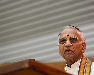 Acharya Dr. Sudhakar Rao, with the Hindu Community, speaks during an interfaith vigil for the Pittsburgh Tree of Life Synagogue victims at Temple El Emeth in Liberty on Thursday evening. EMILY MATTHEWS | THE VINDICATOR