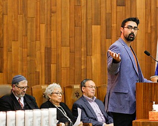 Rev. Joseph Boyd, of the Unitarian Universalist Church, speaks during an interfaith vigil for the Pittsburgh Tree of Life Synagogue victims at Temple El Emeth in Liberty on Thursday evening. EMILY MATTHEWS | THE VINDICATOR