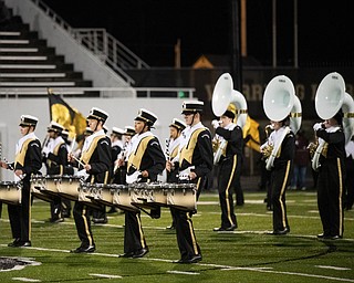 DIANNA OATRIDGE | THE VINDICATOR Warren Harding   drummers and sousaphone players entertain the crowd during the pre game ceremonies  for the Harding and Garfield Heights first round match up at Mollenkopf Stadium in Warren on Friday.