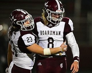 MAPLE HEIGHTS, OHIO - NOVEMBER 2, 2018: Boardman's Mike O'Horo, right, is embraced by Kareem Hamdan, left, after the final change of possession during the 2nd half of their OHSAA Division II playoff game, Friday night at Maple Heights High School. DAVID DERMER | THE VINDICATOR