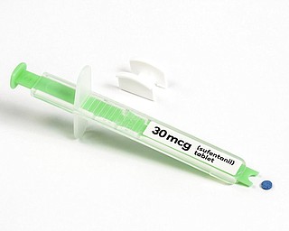 This undated image provided by AcelRx Pharmaceuticals shows the dispenser and a tablet for the company's medication Dsuvia. On Friday, Nov. 2. 2018, U.S. regulators announced the approval of the fast-acting, super-potent opioid tablet as an alternative to IV painkillers used in hospitals.