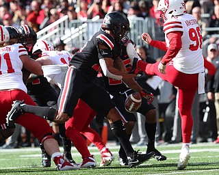 COLUMBUS, OHIO - November 3, 2018, NEBRASKA CORNHUSKERS vs OHIO STATE BUCKEYES at Ohio Stadium- 1st qtr, Ohio State Buckeyes' Keandre Jones (16) blocks the punt of Nebraska Cornhuskers' Issac Armstrong (98) for a safety.. MICHAEL G. TAYLOR | THE YOUNGSTOWN VINDICATOR