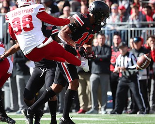 COLUMBUS, OHIO - November 3, 2018, NEBRASKA CORNHUSKERS vs OHIO STATE BUCKEYES at Ohio Stadium- 1st qtr, Ohio State Buckeyes' Keandre Jones (16) blocks the punt of Nebraska Cornhuskers' Issac Armstrong (98) for a safety.. MICHAEL G. TAYLOR | THE YOUNGSTOWN VINDICATOR