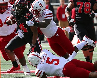 COLUMBUS, OHIO - November 3, 2018, NEBRASKA CORNHUSKERS vs OHIO STATE BUCKEYES at Ohio Stadium- 1st qtr, Ohio State Buckeyes' K.J. Hill Jr (14) makes the catch for a first down as Nebraska Cornhuskers' Mohamer Barry (7)  makes the tackle.. MICHAEL G. TAYLOR | THE YOUNGSTOWN VINDICATOR