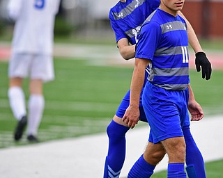 NILES, OHIO - NOVEMBER 3, 2018: Hubbard's Michael VanSuch gets a pat not he back from Jacob Gulu after being subbed out after receiving a yellow card during the second half of the OHSAA Division 2 Regional Finals, Saturday afternoon at Niles High School. Hubbard's Michael VanSuch pictured. DAVID DERMER | THE VINDICATOR