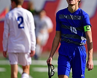 NILES, OHIO - NOVEMBER 3, 2018: Hubbard's A.J. Trobek walks off the field after Hubbard was defeated 2-1 by Revere in the OHSAA Division 2 Regional Finals, Saturday afternoon at Niles High School. Hubbard's Michael VanSuch pictured. DAVID DERMER | THE VINDICATOR