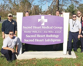 Pictured is Cortland firefighter/paramedic Todd Metzendorf’s hurricane relief task force. The full 35-person team was deployed to Florida from Erie, Pa. From left, Ken Haley, Jeff Meyers,  Metzendorf, Gary Zahn, William VanDuzer, Chuck Earle and Nancy Tabor.