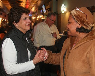 William D. Lewis The Vindicator   Carol Rimedio-Righetti. Mahoning commissioner gets congrats from Audrey Tillis of Austintown during an election night watch party at Avalon in Youngstown.