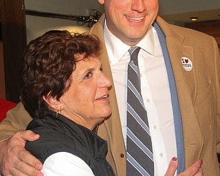 William D. Lewis The Vindicator  Tim Ryan gets a hug from Carol Rimedio Righetti during election night watch party at Avalon in Youngstown.