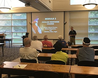 Neighbors | Jessica Harker.Community members gathered at the Austintown library Oct. 9 for the civilian responce course put on by the Austintown Police Department.