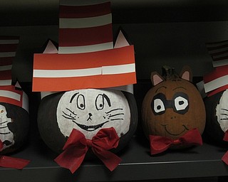 Neighbors | Jessica Harker.Second-graders at Poland Union Elementary School decorated pumpkins to look like famous literary characters, like The Cat and the Hat and Arthur.