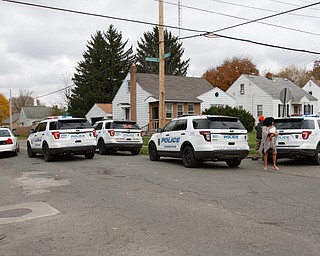  ROBERT K.YOSAY  | THE VINDICATOR...after a triple homicide at Gibson St and Pasadena Ave on the city's southside Wed Night officers detained a car and arrested the driver on charges of drug paraphernalia and a gun..