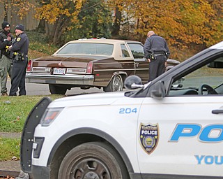  ROBERT K.YOSAY  | THE VINDICATOR...after a triple homicide at Gibson St and Pasadena Ave on the city's southside Wed Night officers detained a car and arrested the driver on charges of drug paraphernalia and a gun..