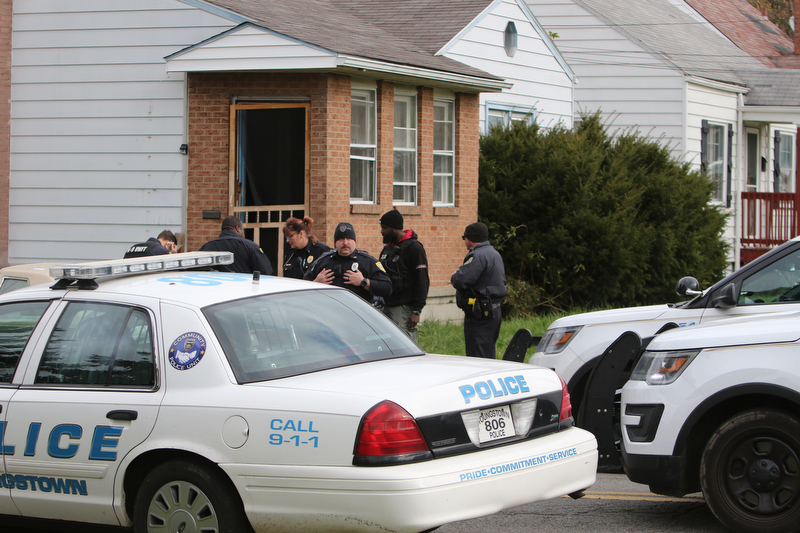  ROBERT K.YOSAY  | THE VINDICATOR...after a triple homicide at Gibson St and Pasadena Ave on the city's southside Wed Night officers detained a car and arrested the driver on charges of drug paraphernalia and a gun..