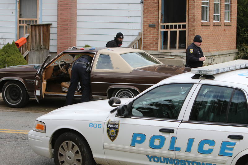  ROBERT K.YOSAY  | THE VINDICATOR...after a triple homicide at Gibson St and Pasadena Ave on the city's southside Wed Night officers detained a car and arrested the driver on charges of drug paraphernalia and a gun..