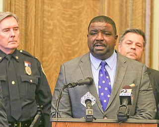  ROBERT K.YOSAY  | THE VINDICATOR..Mayor Tito Brown and Chief Robin Lees..after a triple homicide at Gibson St and Pasadena Ave on the city's southside Wed Night officers detained a car and arrested the driver on charges of drug paraphernalia and a gun..