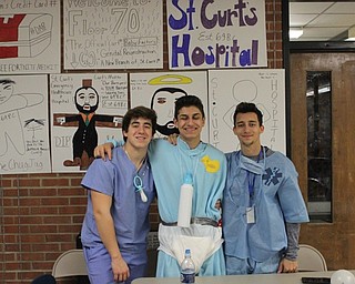 Neighbors | Abby Slanker.A group of Canfield High School senior boys went with a hospital theme, dressing as doctors and patients for the school’s annual Halloween Dress Up Day.