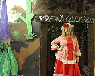 Neighbors | Abby Slanker.Canfield High School librarian Jen Kuczek ‘hosted’ the school’s haunted house, which had a theme of Dead Gulch Mine, during the school’s annual Halloween Dress Up Day.