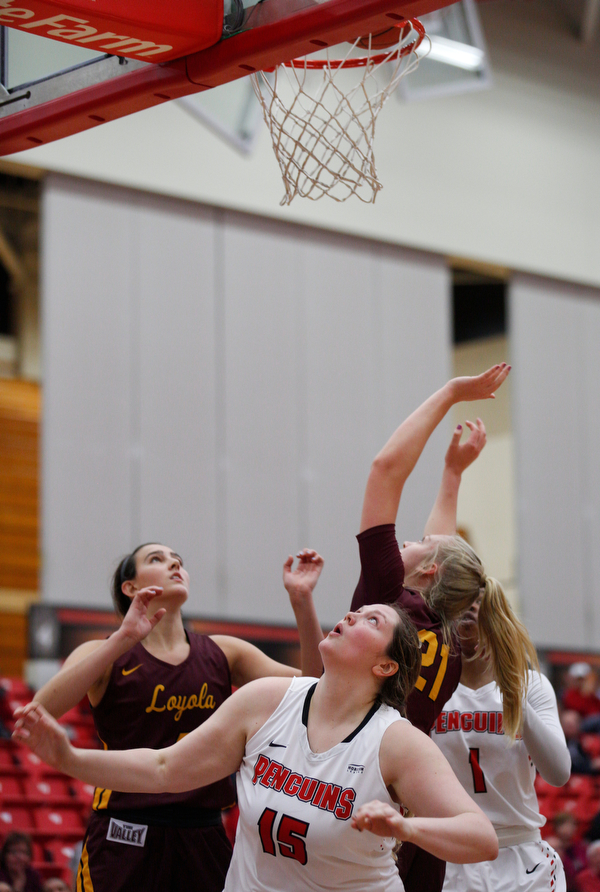 YSU's Mary Dunn watches as the ball goes into the hoop and YSU scores during the first half of their game against Loyola at YSU on Friday night. EMILY MATTHEWS | THE VINDICATOR