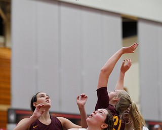 YSU's Mary Dunn watches as the ball goes into the hoop and YSU scores during the first half of their game against Loyola at YSU on Friday night. EMILY MATTHEWS | THE VINDICATOR