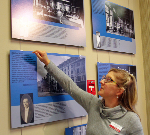 William D. Lewis the Vindicator  Cassie Nespor, a currator at the YSU Maag Library shows photos form an exhibit on Valley involvement in WW1. Nurses and doctors form the Valley served in a field hospital in France.
