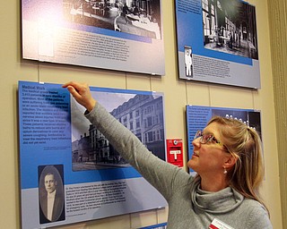 William D. Lewis the Vindicator  Cassie Nespor, a currator at the YSU Maag Library shows photos form an exhibit on Valley involvement in WW1. Nurses and doctors form the Valley served in a field hospital in France.