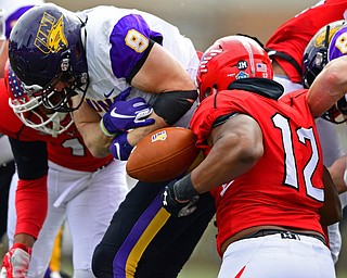 YOUNGSTOWN, OHIO - NOVEMBER 11, 2018: Youngstown State's Ma'lik Richmond rips the ball away from Northern Iowa's Marcus Weymiller during the first half of their game, Saturday afternoon at Stambaugh Stadium. DAVID DERMER | THE VINDICATOR