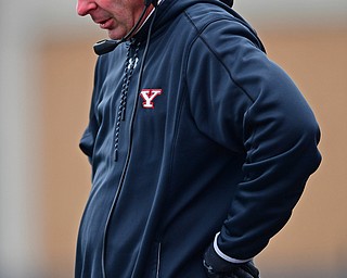 YOUNGSTOWN, OHIO - NOVEMBER 11, 2018: Youngstown State head coach Bo Pelini stands not he sideline during the first half of their game, Saturday afternoon at Stambaugh Stadium. DAVID DERMER | THE VINDICATOR