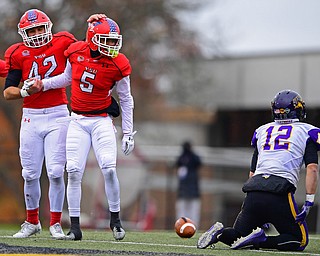 YOUNGSTOWN, OHIO - NOVEMBER 11, 2018: Youngstown State's Armand Dellovade, left, congratulated Will Latham after breaking up a pass intended for Northern Iowa's Nick Phillips during the first half of their game, Saturday afternoon at Stambaugh Stadium. DAVID DERMER | THE VINDICATOR