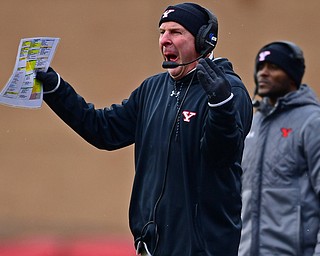 YOUNGSTOWN, OHIO - NOVEMBER 11, 2018: Youngstown State head coach Bo Pelini shouts from the sideline during the first half of their game, Saturday afternoon at Stambaugh Stadium. DAVID DERMER | THE VINDICATOR