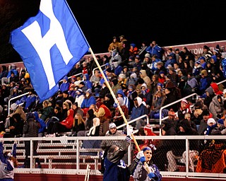 Hubbard cheerleaders run with a flag after Hubbard scores a touchdown against Steubenville during the first half of their game on Saturday night at Boardman. EMILY MATTHEWS | THE VINDICATOR