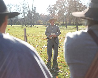 Ron Novak, of Columbiana, speaks about local veterans at their grave sites during the Forgotten Heroes program in Forest Lawn Cemetery in Boardman on Sunday. EMILY MATTHEWS | THE VINDICATOR
