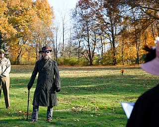 Ron Johnson, of Boardman, speaks about local veterans at their grave sites during the Forgotten Heroes program in Forest Lawn Cemetery in Boardman on Sunday. EMILY MATTHEWS | THE VINDICATOR