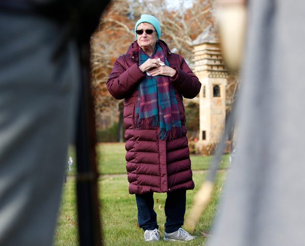 Suzanne Zadell, of Vermilion, speaks about her father, Raymond Eckert, who had been a sergeant with the 82nd Airborne Medical Division and died after his glider crashed on D-Day, during the Forgotten Heroes program in Forest Lawn Cemetery in Boardman on Sunday. EMILY MATTHEWS | THE VINDICATOR
