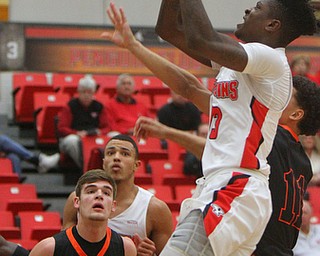 William D. Lewis The Vindicator  YSU's Donel Cathcart III goes for 2 during 11-12-18 action at YSU.