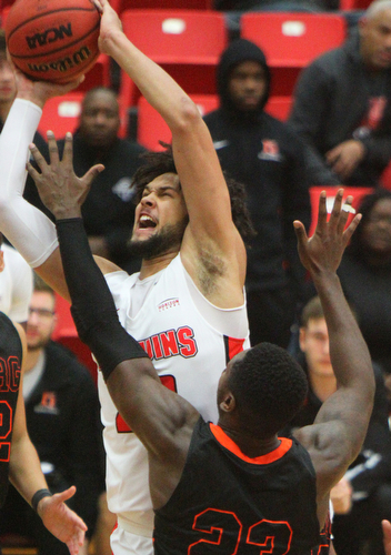 William D. Lewis The Vindicator  YSU Olamide Pedersen(23) goes for 2 past Heildelberg's Myron Prewitt(23) during 11-12-18 action at YSU.