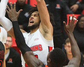 William D. Lewis The Vindicator  YSU Olamide Pedersen(23) goes for 2 past Heildelberg's Myron Prewitt(23) during 11-12-18 action at YSU.