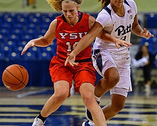 PITTSBURGH, PENNSYLVANIA - NOVEMBER 13, 2018: Youngstown State's Melinda Trimmer collides with Pittsburgh's Jasmine Whitney during the second half of their game, Tuesday night at the Petersen Events Center. Youngstown State won 64-55. DAVID DERMER | THE VINDICATOR