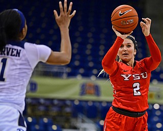 PITTSBURGH, PENNSYLVANIA - NOVEMBER 13, 2018: Youngstown State's Alison Smolinski shoots a three point shot over Pittsburgh's Danielle Garven during the second half of their game, Tuesday night at the Petersen Events Center. Youngstown State won 64-55. DAVID DERMER | THE VINDICATOR