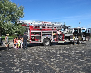 Neighbors | Jessica Harker.Members of the Boardman Fire Department drove a fire truck to Stadium Drive Elementary School on Oct. 9 to show children how the truck works and teach them about fire safety.