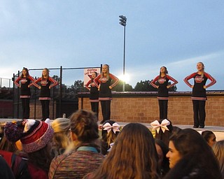 Neighbors | Jessica Harker.Canfield high school freshman cheerleaders performed for the community Oct. 26 at the schools annual bonfire event.
