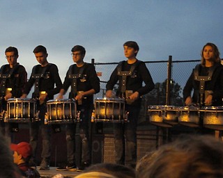 Neighbors | Jessica Harker.The Canfield High School drum line performed for the school's annual community bonfire event Oct. 26.