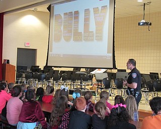 Neighbors | Jessica Harker.D.A.R.E. officer David Potkonicki addressed third-grade students at Austintown Intermediate School on Oct. 29 for the end of Bullying Prevention Month.