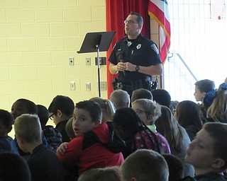 Neighbors | Jessica Harker.D.A.R.E. officer David Potkonicki spoke to third-grade students Oct. 29 about how to spot and prevent bullying at Austintown Intermediate School.