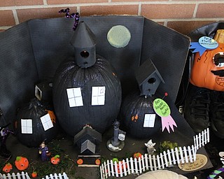 Neighbors | Abby Slanker.A C.H. Campbell Elementary School student earned the Best Haunted Hallow Pumpkin award for this three-piece haunted house decorated pumpkin for the school’s annual pumpkin decorating contest the week of Halloween.