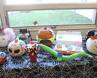 Neighbors | Abby Slanker.Students at C.H. Campbell Elementary School brought in elaborately decorated pumpkins for the school’s annual pumpkin decorating contest the week of Halloween, including Sneakiest Snake, Too Cute to Eat, Best Bubbilicious Gumballs, Best Yummy Juice Burger, Most Magical Minnie and #1 Diva.