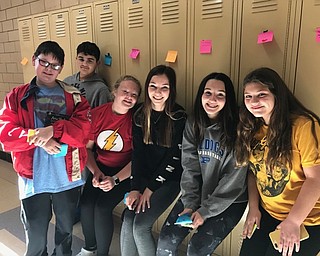 Neighbors | Jessica Harker.Student members of the Kindness Club, from left, Nicholas McGoogan, Anastasios Efthimiou, Ella Gaffney, Gia Len, Francesca Rubesa and Bella Beight walked through Poland Middle School posting sticky notes on all of the lockers.