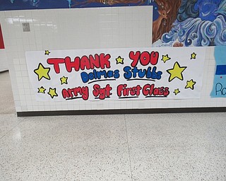 Neighbors | Jessica Harker.Students at Austintown Fitch hung banners in the hallway thanking Delmas Stubbs, who spoke during the school's veterans day assembly Nov. 12.
