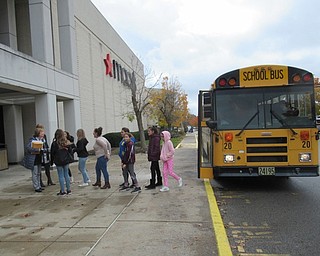 Neighbors | Jessica Harker.Sixth-graders exited the school bus at the Boardman Macy's on Nov. 5 for the Girl Empowerment Mentorship Program field trip.